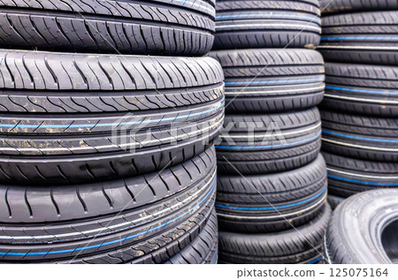 Summer vehicle tires stacked up Summer vehicle tires stacked up 125075164