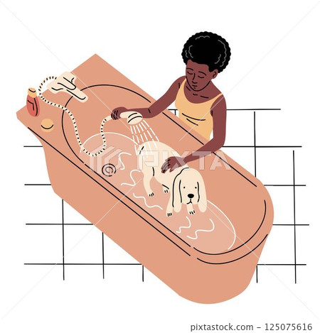 A woman washes her dog in the bathroom 125075616