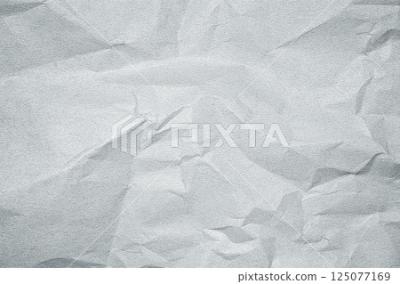 Crumpled gray paper texture forming an abstract background 125077169