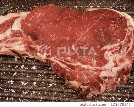 Raw Rob meat on the grill Raw Rob meat on the grill 125078141