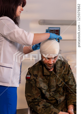 Providing medical treatment for injured soldiers in military settings is vital for recovery Providing medical treatment for injured soldiers in military settings is vital for recovery 125078862