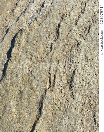 Rough brown stone texture background Rough brown stone texture background 125079714