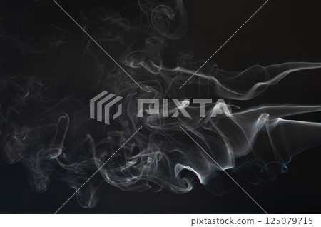 Smoke flow swirls 125079715