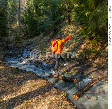 cross a mountain stream active lifestyle cross a mountain stream active lifestyle 125080529