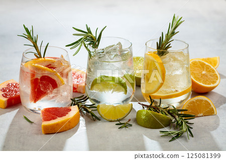 Summer refreshing drinks with ice, citrus and rosemary. Summer refreshing drinks with ice, citrus and rosemary. 125081399