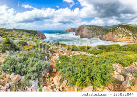 Unbelivable view of cliffs in valley Cala Domestica and storm on the sea Unbelivable view of cliffs in valley Cala Domestica and storm on the sea 125082044