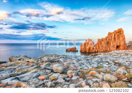 Impressive sunset view of Red Rocks (Rocce Rosse) in Arbatax. 125082102