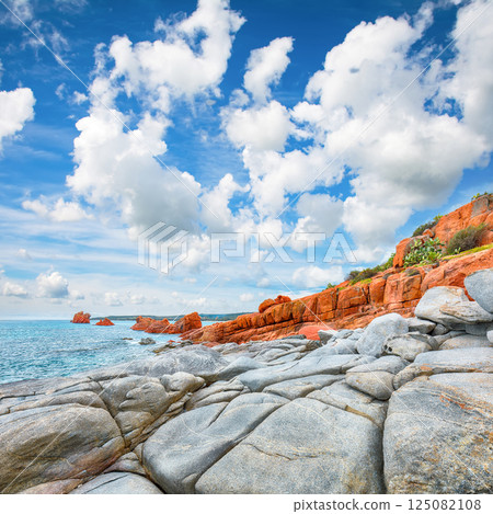 Impressive view of Red Rocks (is Scoglius Arrubius) on Cea beach. 125082108