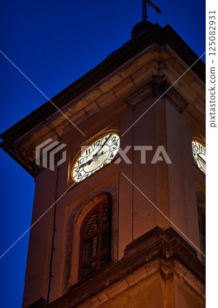 Old church tower in Europe at night Old church tower in Europe at night 125082931