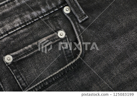 Dark denim jeans pocket detail Dark denim jeans pocket detail 125083199
