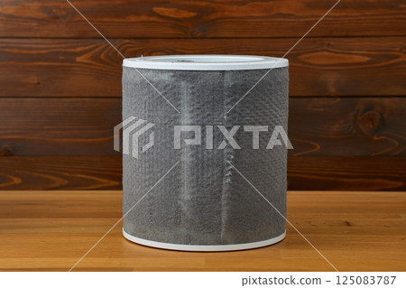Dirty air purifier filter replacement, full of dust Dirty air purifier filter replacement, full of dust 125083787