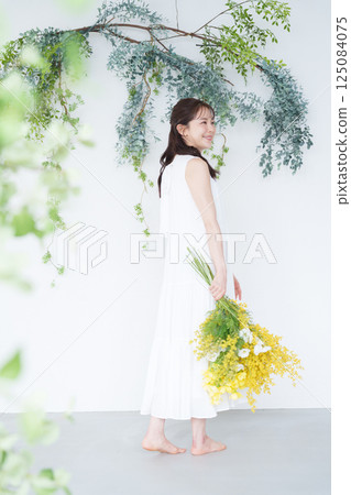 Woman with a bouquet 125084075
