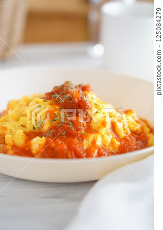 Tomato sauce omelet rice Tomato sauce omelet rice 125084279