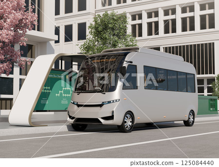 An image of an electric bus parked at a bus stop. 125084440