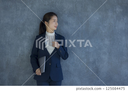 Woman in a suit 125084475