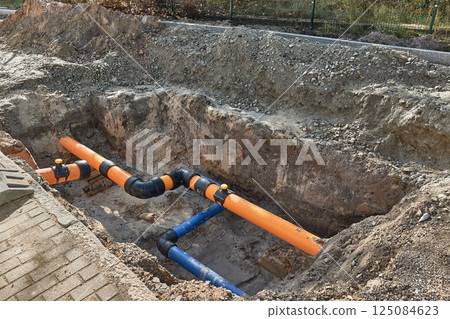Construction site water utility pipes 125084623