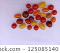 Colorful cherry tomatoes (red, red-purple, yellow, orange) (white background) 125085140