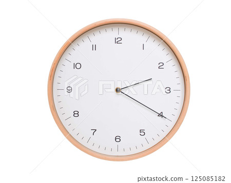 Minimal wall clock with light wood frame and white face displaying 02:20 or 14:20. Perfect for clean, modern concepts about time and scheduling. 125085182