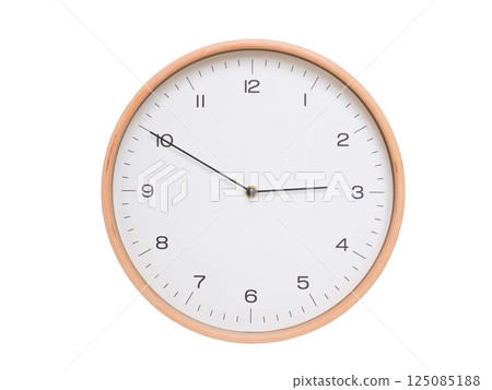 Minimal wall clock with light wood frame and white face displaying 02:50 or 14:50. Perfect for clean, modern concepts about time and scheduling. 125085188