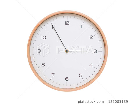 Minimal wall clock with light wood frame and white face displaying 02:55 or 14:55. Perfect for clean, modern concepts about time and scheduling. 125085189