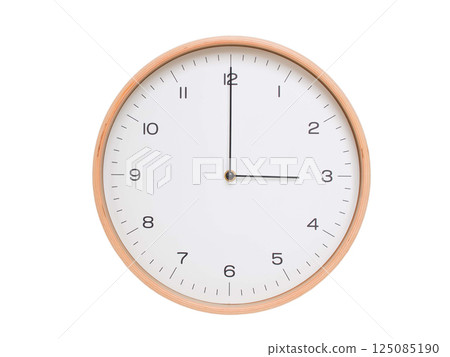 Minimal wall clock with light wood frame and white face displaying 03:00 or 15:00. Perfect for clean, modern concepts about time and scheduling. Minimal wall clock with light wood frame and white face displaying 03:00 or 15:00. Perfect for clean, modern concepts about time and scheduling. 125085190