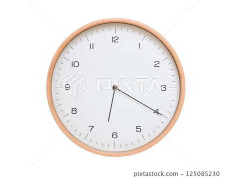 Minimal wall clock with light wood frame and white face displaying 06:20 or 18:20. Perfect for clean, modern concepts about time and scheduling. 125085230