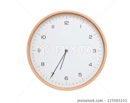 Minimal wall clock with light wood frame and white face displaying 06:35 or 18:35. Perfect for clean, modern concepts about time and scheduling. 125085233