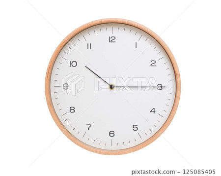 Minimal wall clock with light wood frame and white face displaying 10:15 or 22:15. Perfect for clean, modern concepts about time and scheduling. 125085405