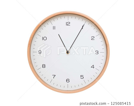 Minimal wall clock with light wood frame and white face displaying 11:05 or 23:05. Perfect for clean, modern concepts about time and scheduling. 125085415