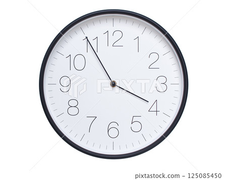 Simple wall clock with black frame and white face displaying 03:55 or 15:55. Ideal for time, schedule, and punctuality themes. Simple wall clock with black frame and white face displaying 03:55 or 15:55. Ideal for time, schedule, and punctuality themes. 125085450