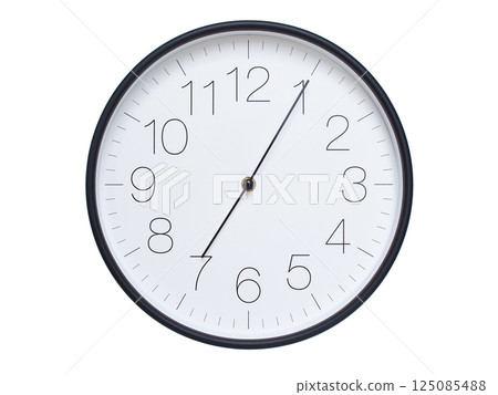 Simple wall clock with black frame and white face displaying 07:05 or 19:05. Ideal for time, schedule, and punctuality themes. 125085488