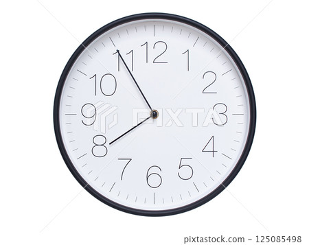 Simple wall clock with black frame and white face displaying 07:55 or 19:55. Ideal for time, schedule, and punctuality themes. 125085498