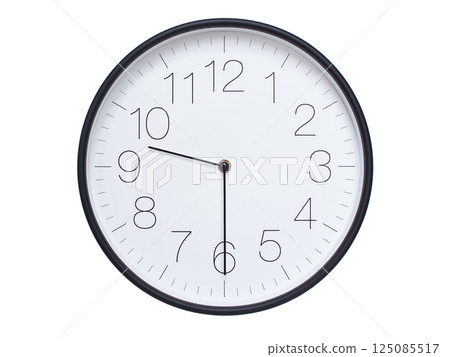 Simple wall clock with black frame and white face displaying 09:30 or 21:30. Ideal for time, schedule, and punctuality themes. 125085517