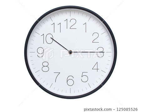 Simple wall clock with black frame and white face displaying 10:15 or 22:15. Ideal for time, schedule, and punctuality themes. Simple wall clock with black frame and white face displaying 10:15 or 22:15. Ideal for time, schedule, and punctuality themes. 125085526