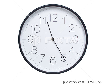 Simple wall clock with black frame and white face displaying 11:25 or 23:25. Ideal for time, schedule, and punctuality themes. 125085540