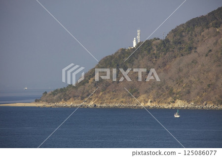 Jizozaki Lighthouse as seen from the Jumbo Ferry "Aoi" departing from Sakate Port, Shodoshima Jizozaki Lighthouse as seen from the Jumbo Ferry "Aoi" departing from Sakate Port, Shodoshima 125086077