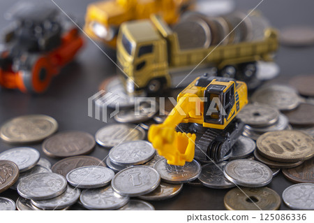 工程車輛與硬幣儲蓄投資 工程車輛與硬幣儲蓄投資 125086336