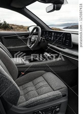 Modern Electric Vehicle Interior with Ergonomic Design and Sleek Aesthetics 125087418