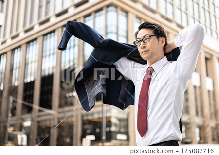 A businessman wearing a jacket 125087716