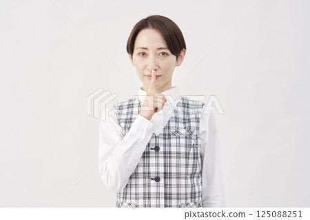 Female office worker secret gesture white background Female office worker secret gesture white background 125088251