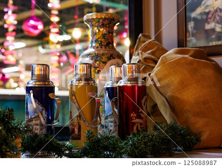 Vibrant decor and cultural artifacts create a unique atmosphere in a bustling Chinese restaurant setting 125088987