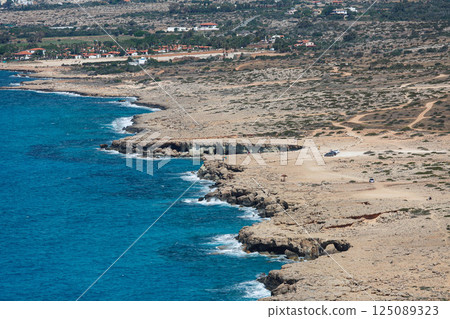 Explore the breathtaking coastal landscapes of Ayia Napa in Larnaka, Cyprus during a warm sunny day 125089323