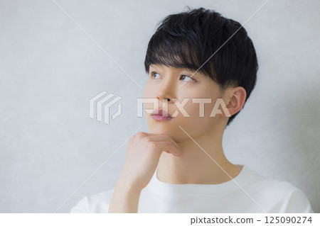 man wearing white t-shirt man wearing white t-shirt 125090274