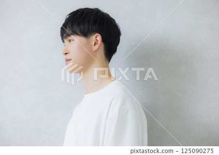 man wearing white t-shirt man wearing white t-shirt 125090275