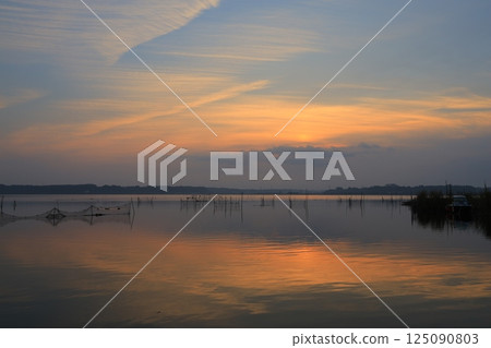 Cloudy sunrise 125090803