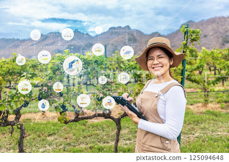 Smart vineyard system with winegrower working with digital graphic display Smart vineyard system with winegrower working with digital graphic display 125094648
