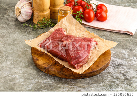 Raw marble uncooked beef steak Raw marble uncooked beef steak 125095635