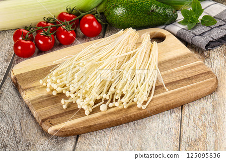 Raw enoki mushroom for cooking 125095836
