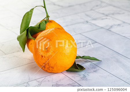 Sweet maniola citrus tropical fruit Sweet maniola citrus tropical fruit 125096004
