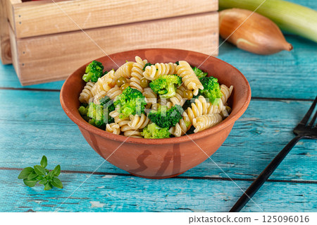 Italian vegan pasta fusilli with broccoli Italian vegan pasta fusilli with broccoli 125096016